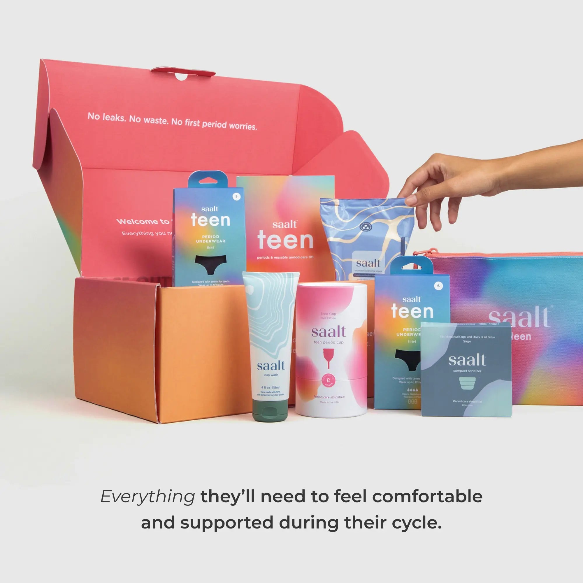 Collection of saalt teen products including boxes, a tube, and containers on a white background.