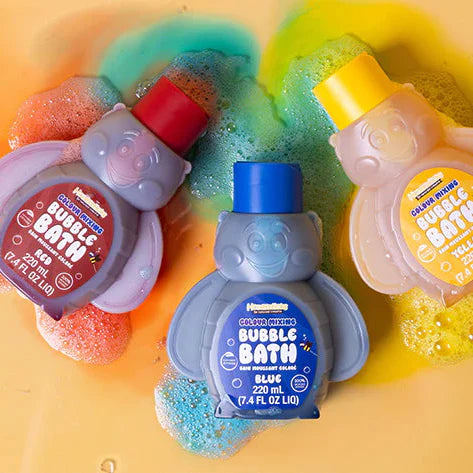 Three bottles of bubble bath with colorful foam on a yellow background