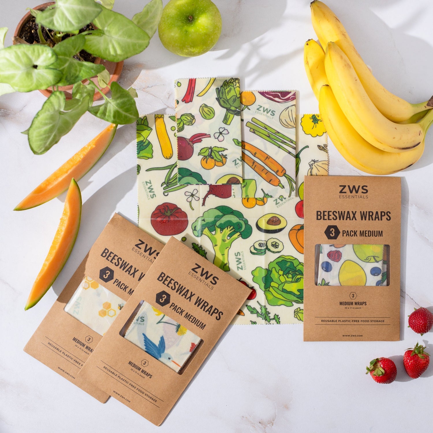 ZWS beeswax wraps packaging with fruits and vegetables on a white surface