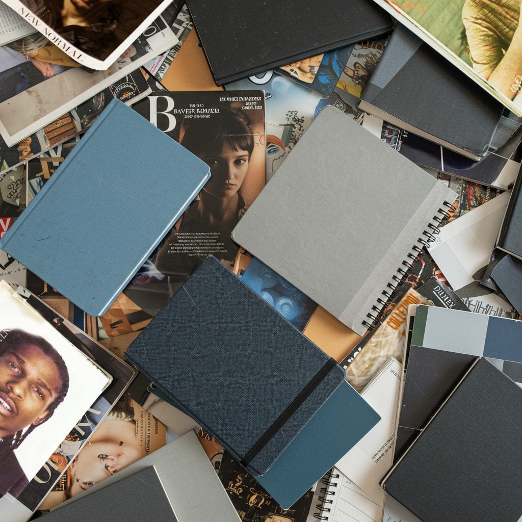 Collection of notebooks and photo albums on a collage background