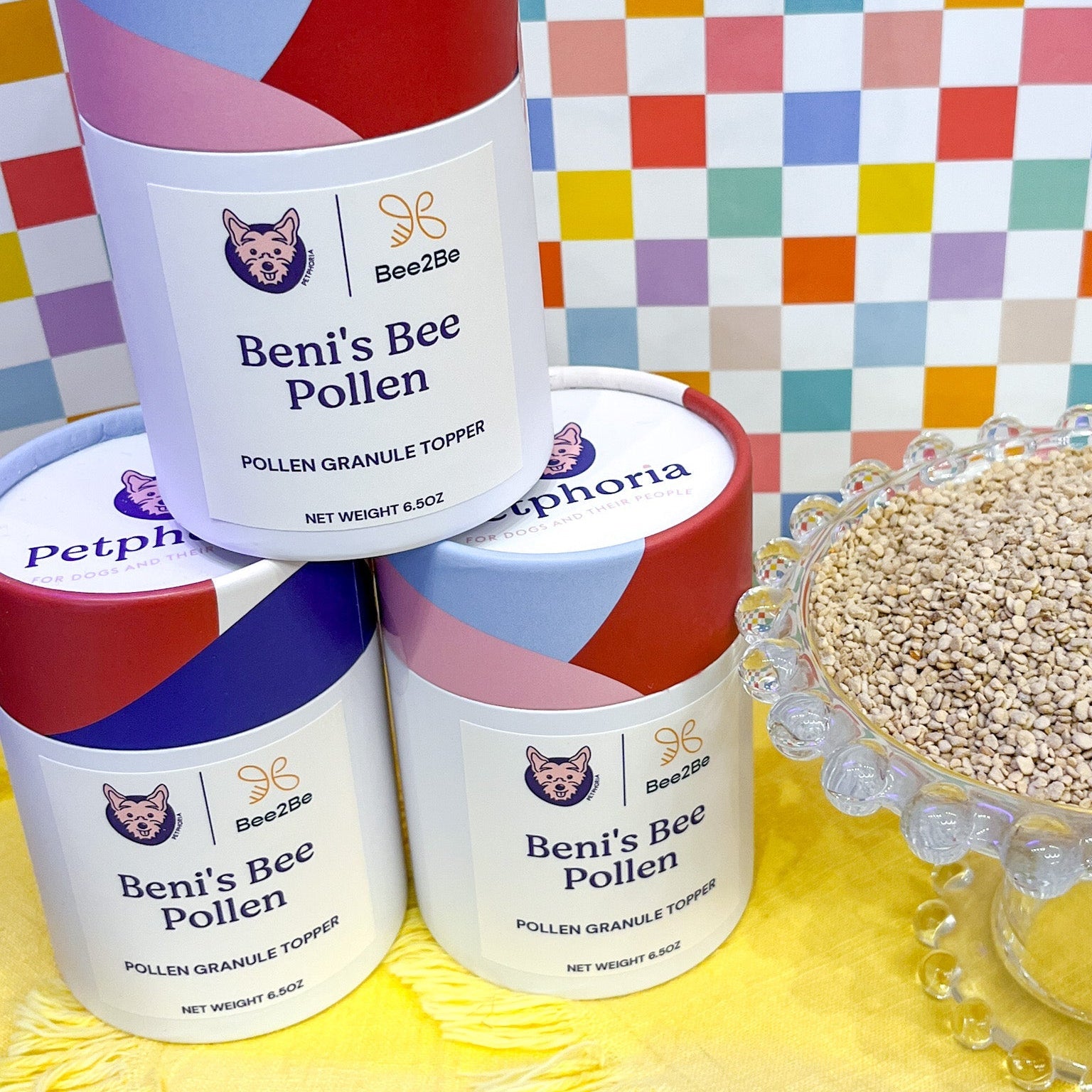 Bené's Bee Pollen containers with a colorful checkered background