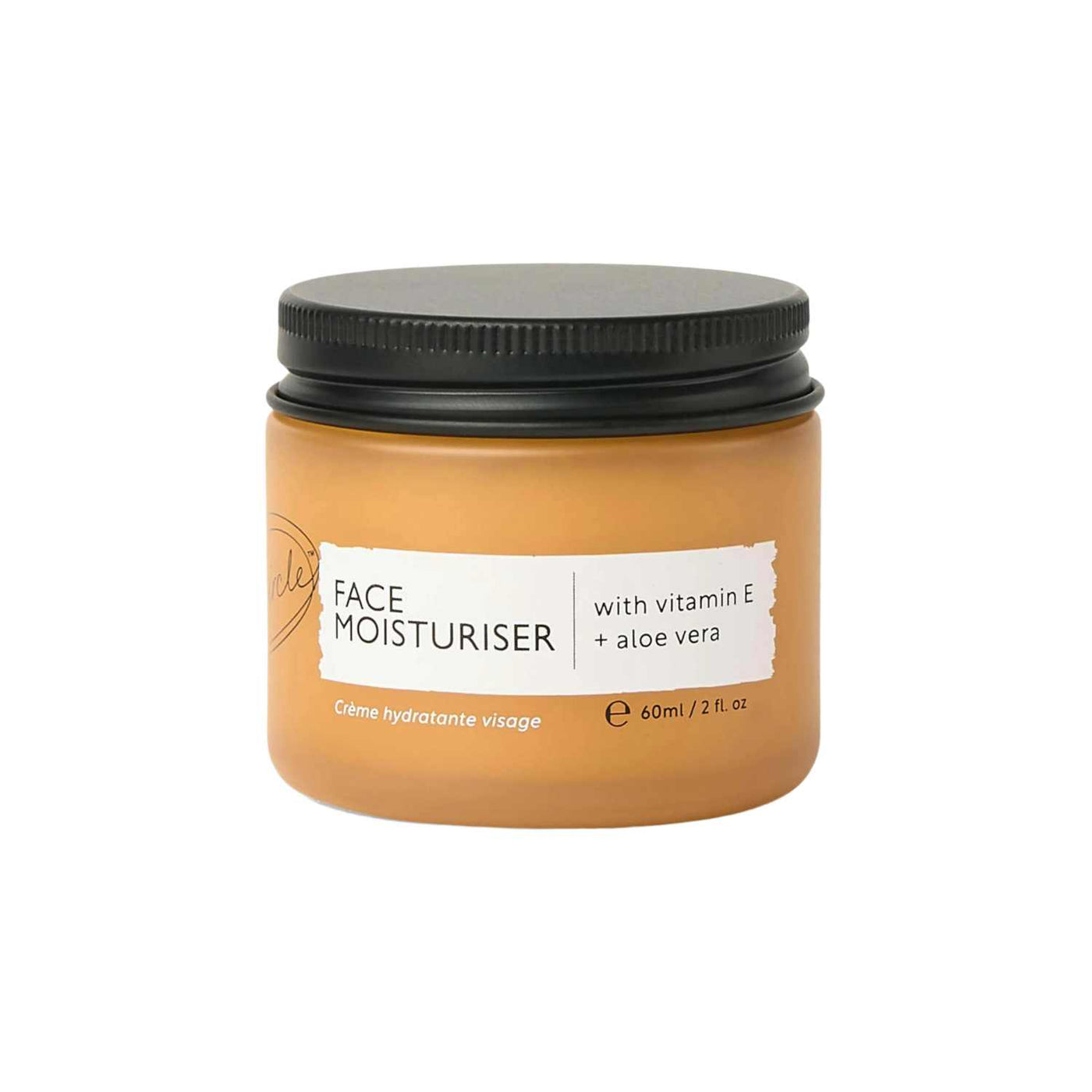 Jar of face moisturizer with black lid on a white background